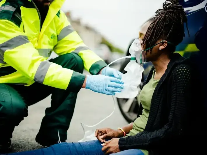 Attorney meeting injured client about lost wages and medical bills after DUI truck accident near Phoenix Raceway in Avondale